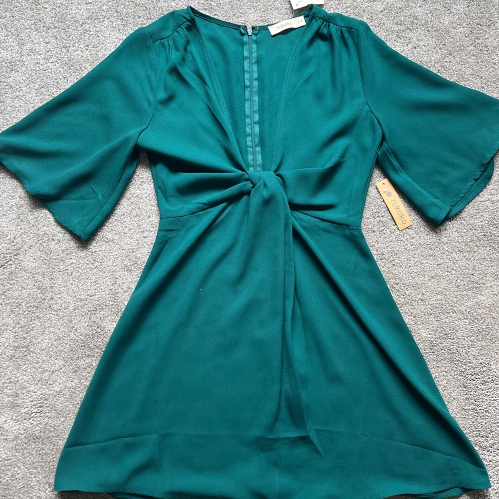Plunge neck emerald green dress